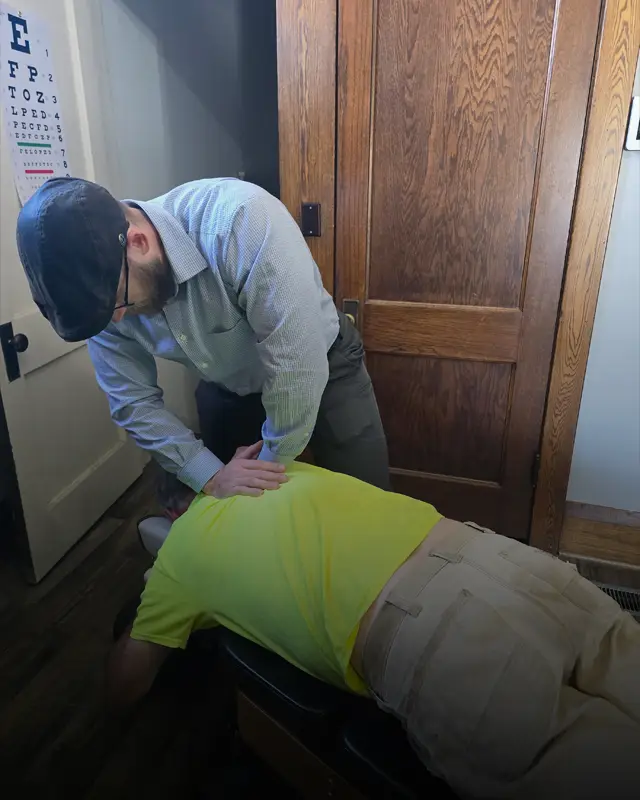 Chiropractor Jacob Stoffel performing a DOT Exam
