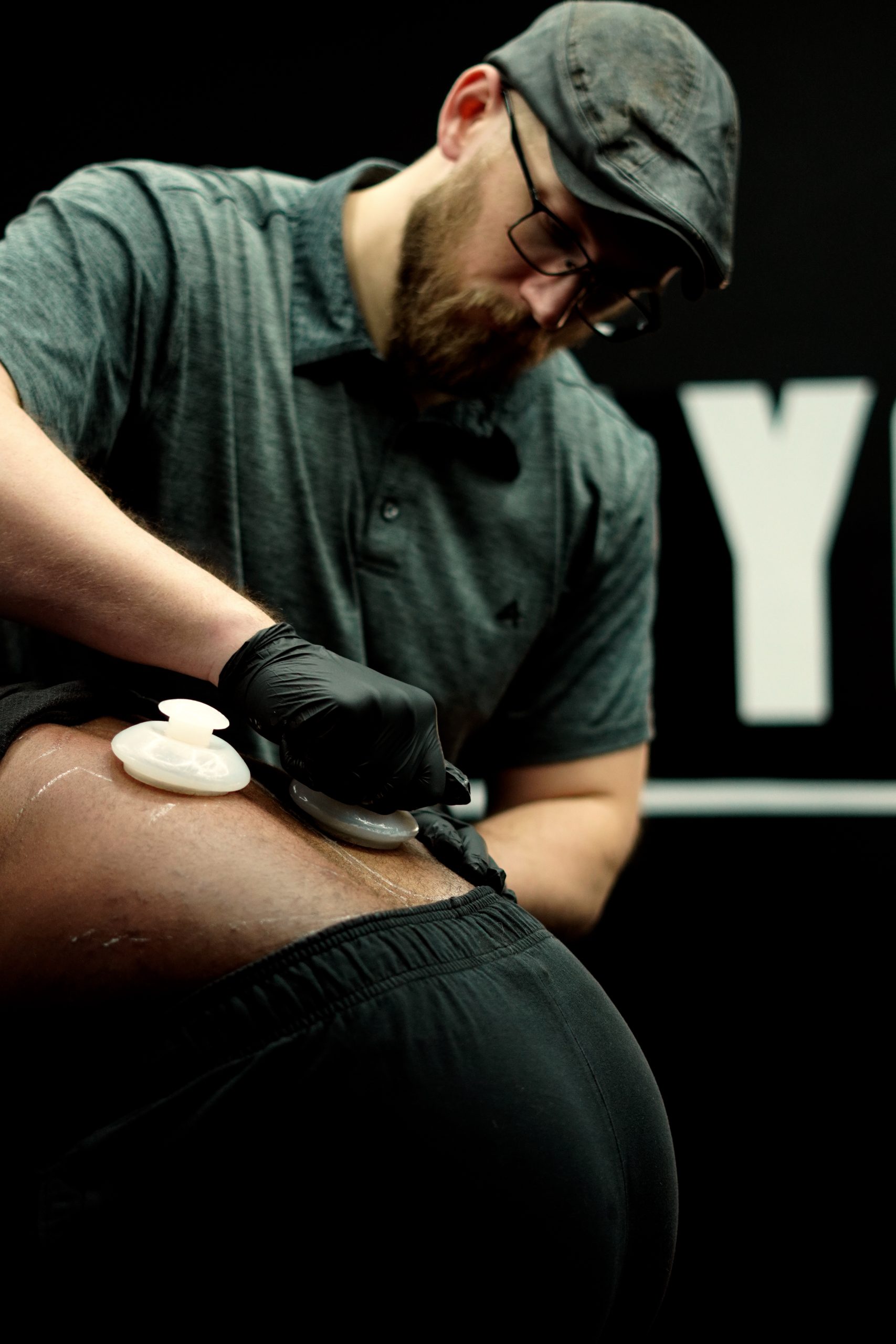 Chiropractor Jacob Stoffel adjusting the lower back of a patient new